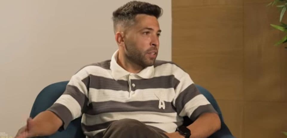 Person sitting in chair during interview