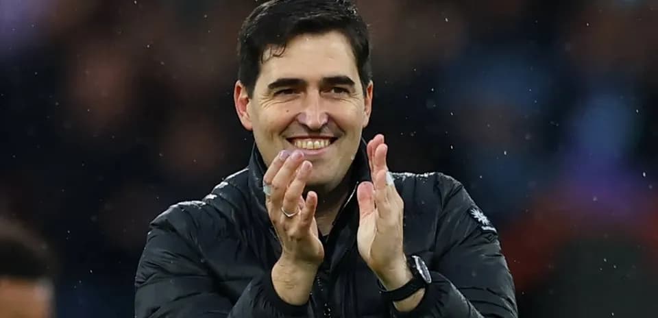 Manager applauding during a match celebration
