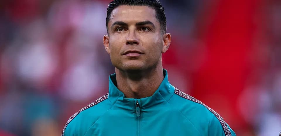 Cristiano Ronaldo in team tracksuit before match