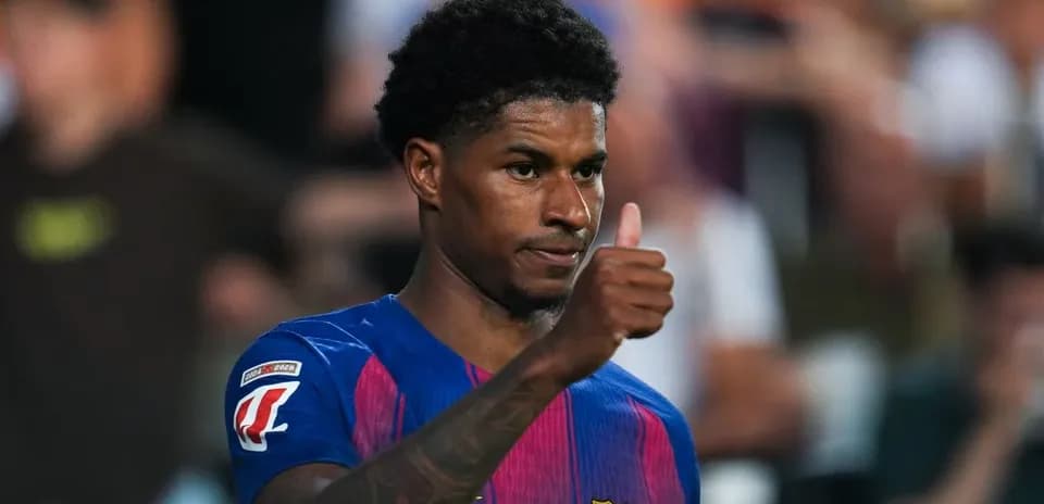 Player giving thumbs up in Barcelona jersey