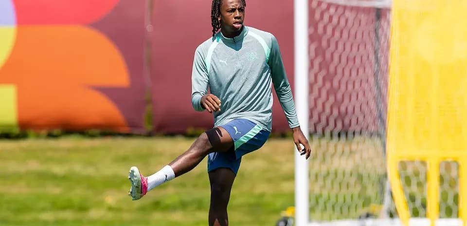 Player stretching leg during training session