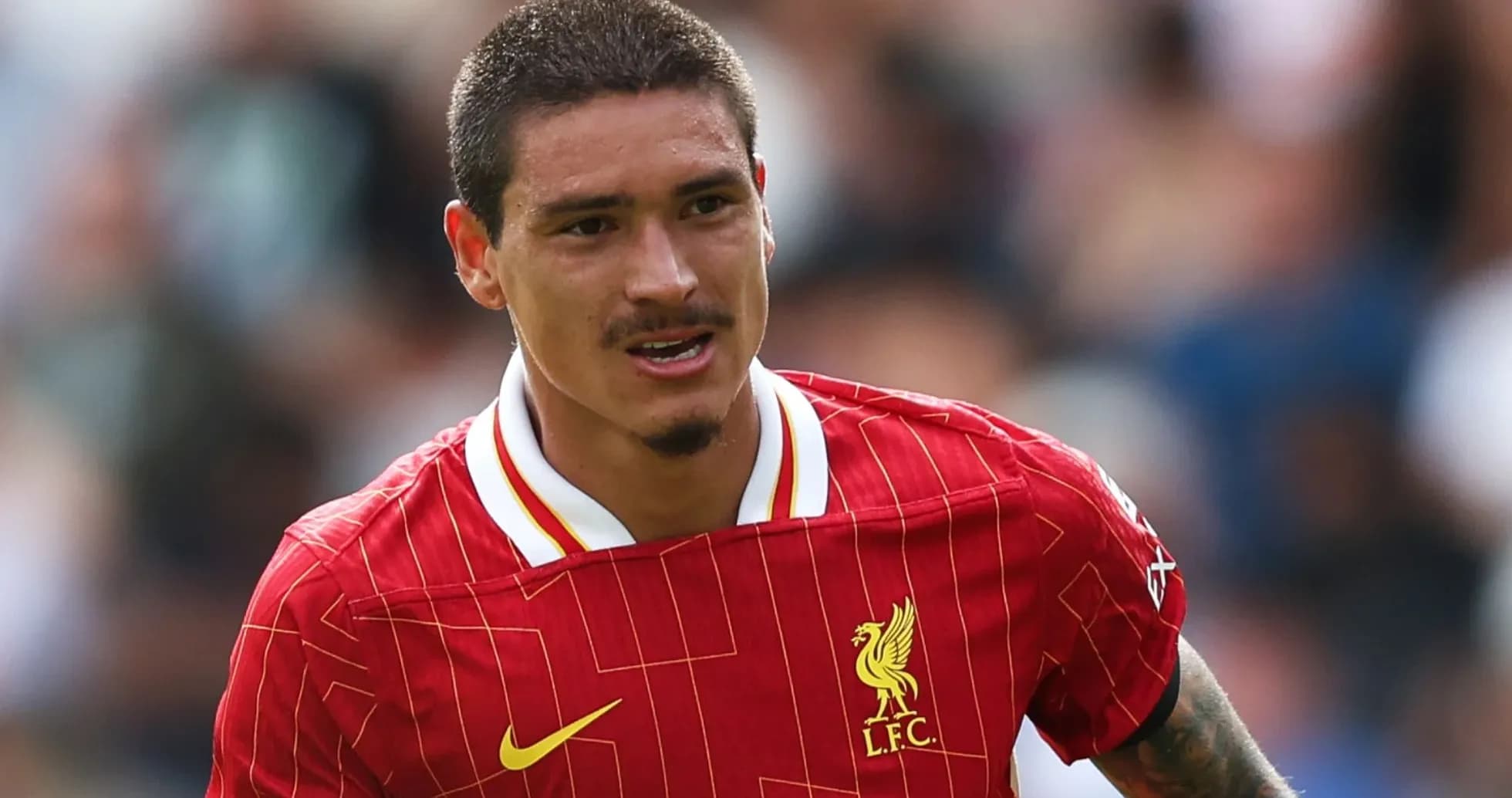 Player in Liverpool kit during match action