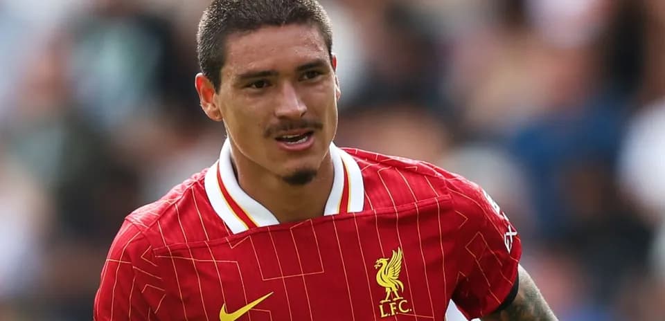Player in Liverpool kit during match action