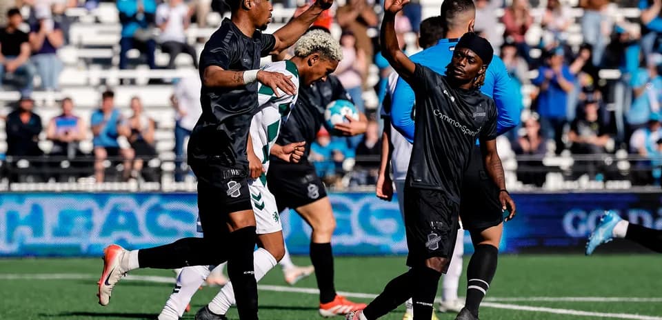 Players celebrating during Colorado Springs match