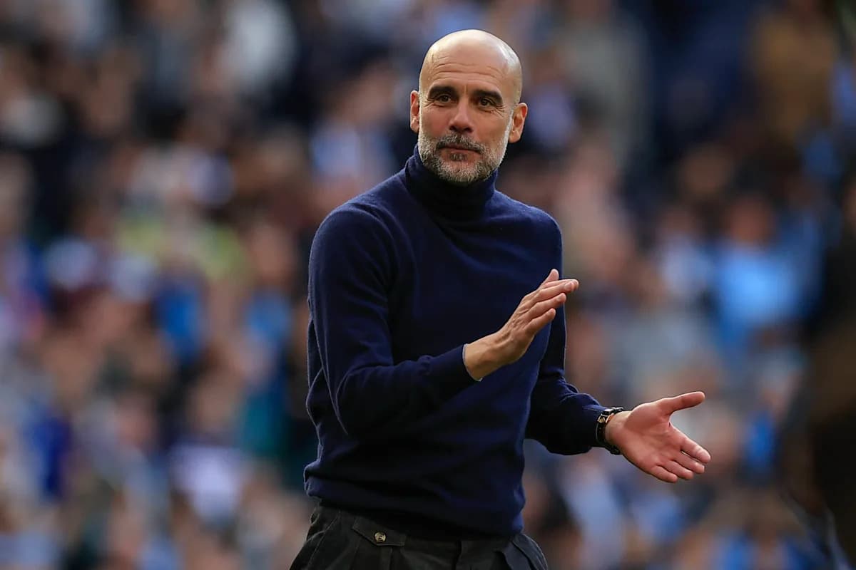 Manager gesturing during a match on the sidelines