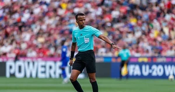 Referee officiating during a football match