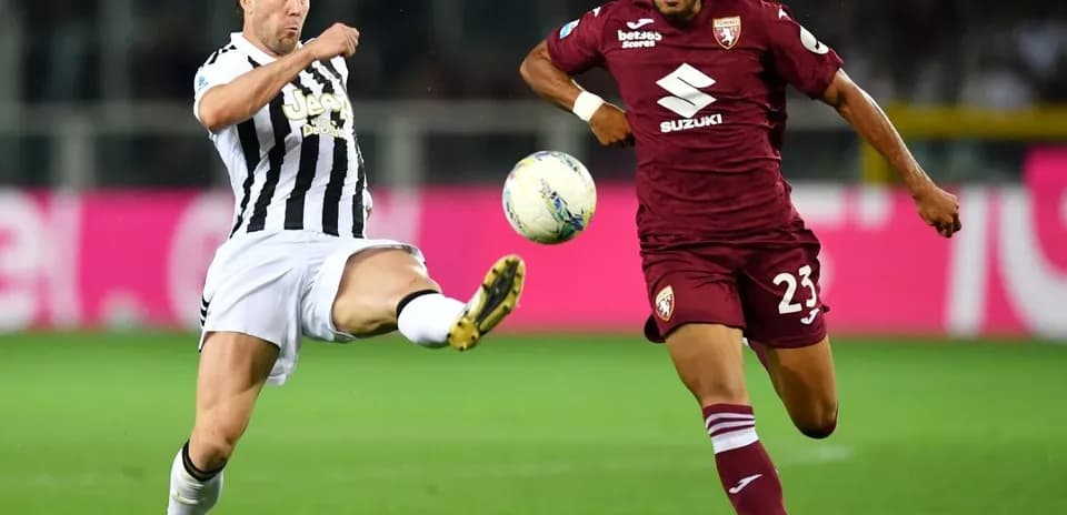 Player kicking the ball during Torino vs Juventus