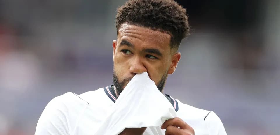Player wiping face with jersey during match