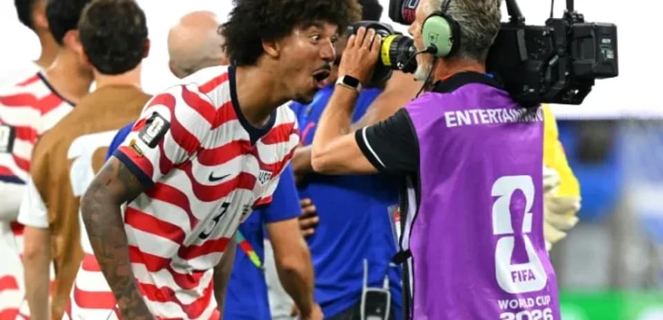 Player celebrating and speaking to camera after match