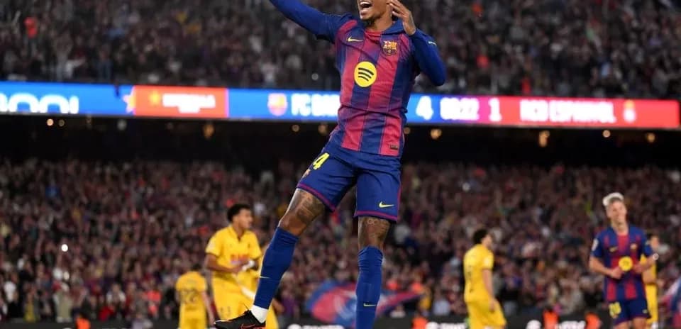 Barcelona player celebrating a goal in stadium