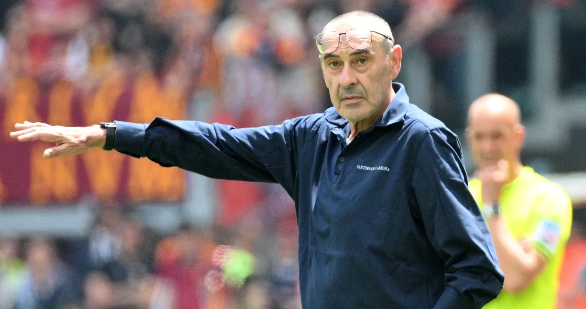 Coach gesturing during a football match