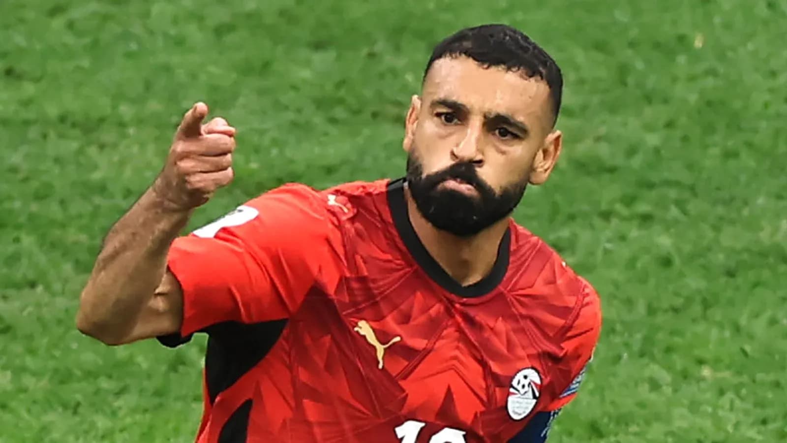 Player celebrating after scoring a goal for Egypt