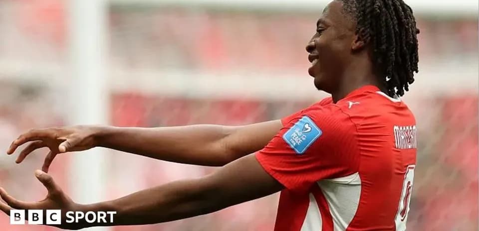 Player celebrating a goal on the pitch