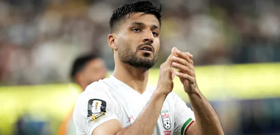 Player applauding fans after the match