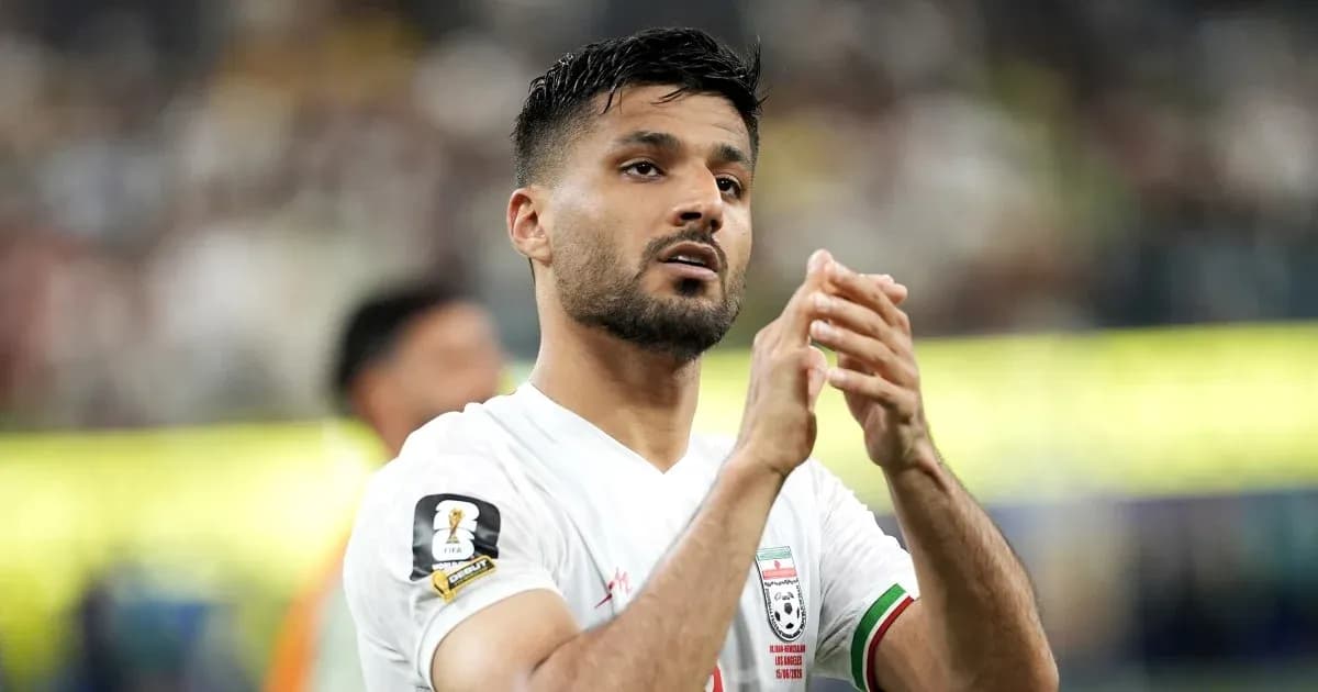 Player applauding fans after the match