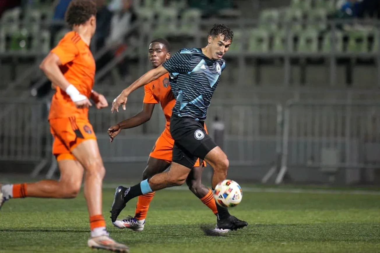 Tacoma Defiance player in action against Houston Dynamo FC II
