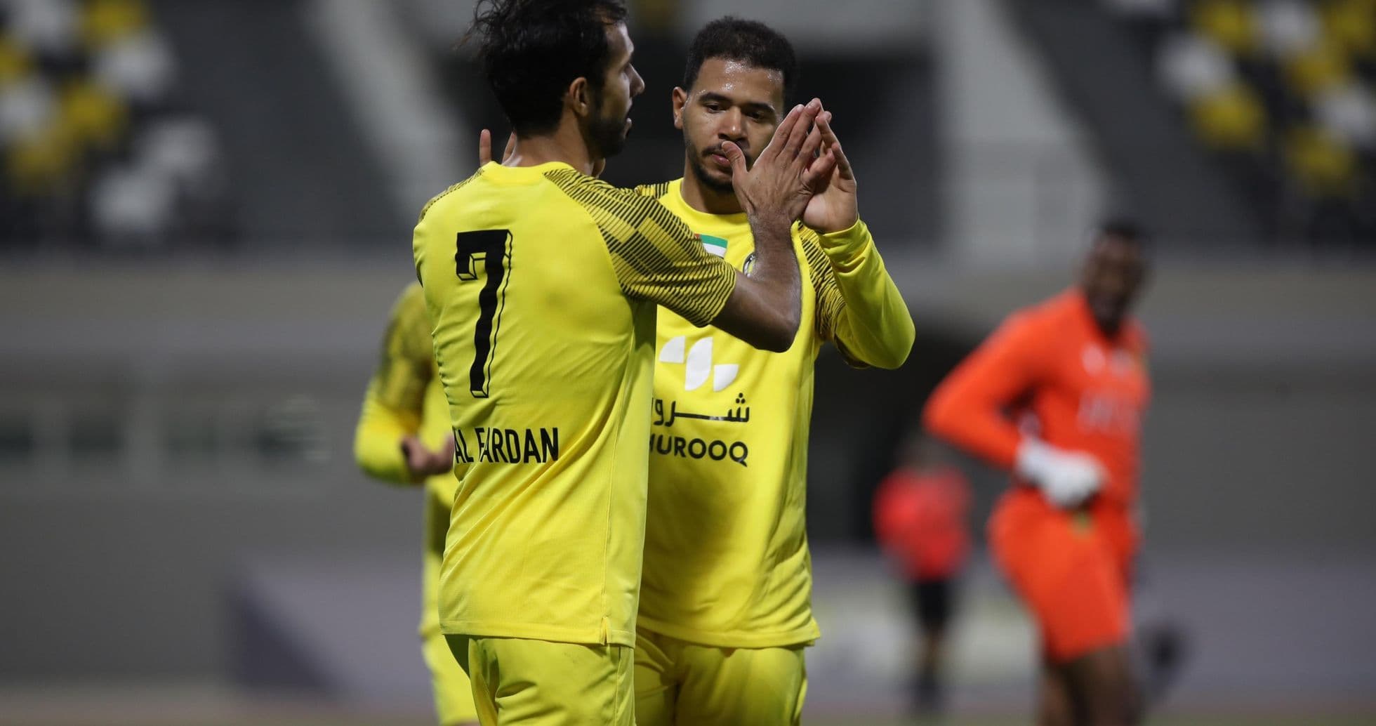 Players celebrating after a goal in U23 match