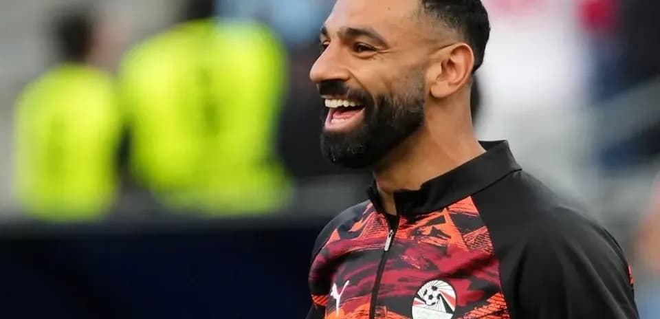 Player smiling during warm-up session before match
