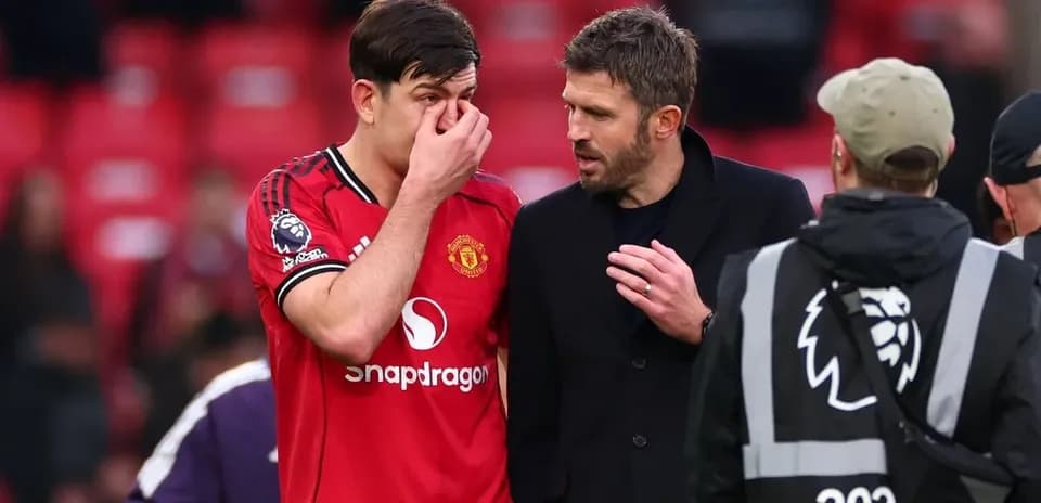 Harry Maguire and Michael Carrick discussing after match