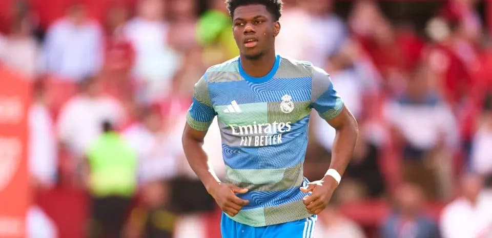 Player warming up before match in team kit