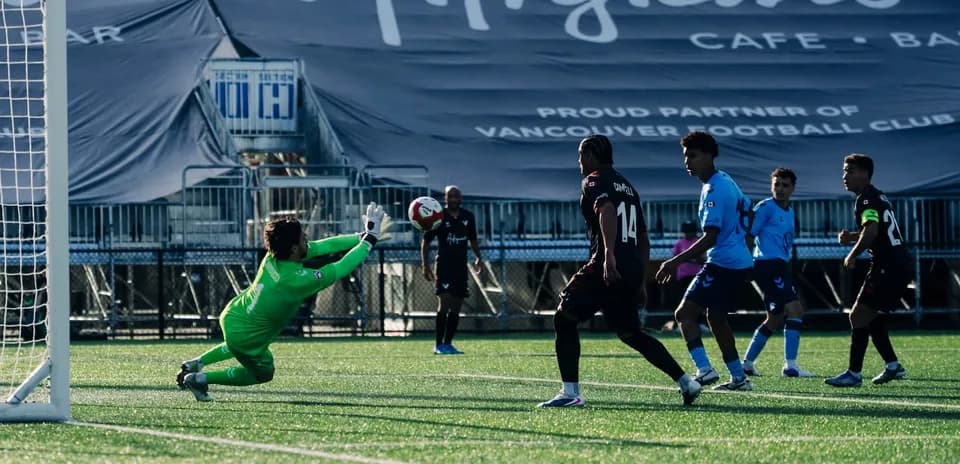 Goalkeeper making a save during match