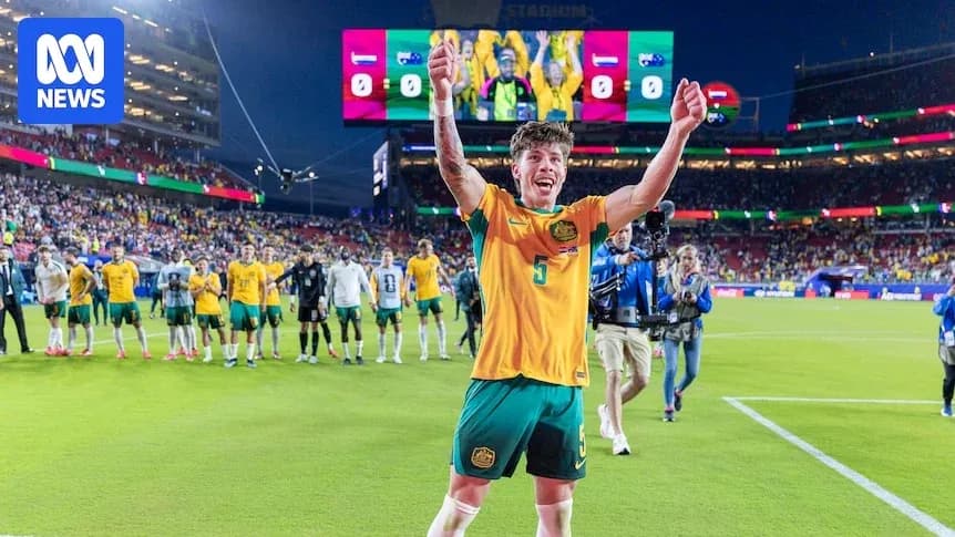 Player celebrating with teammates after match victory