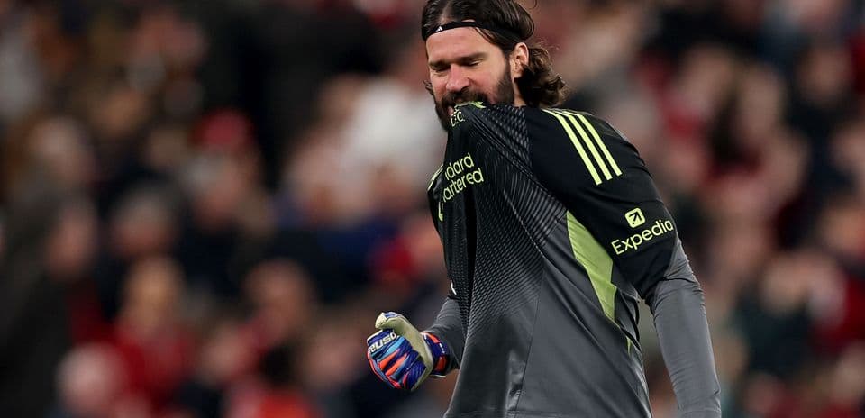 Goalkeeper celebrating in front of the crowd