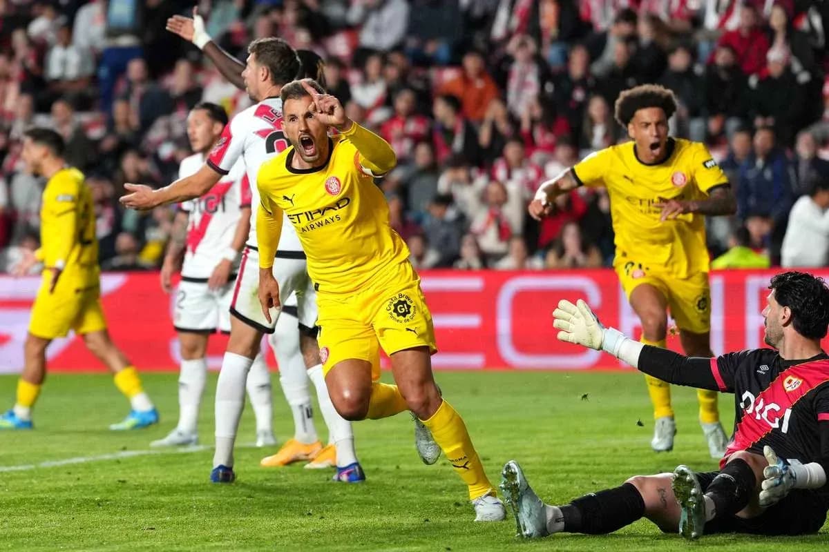 Players celebrating after scoring a goal during match