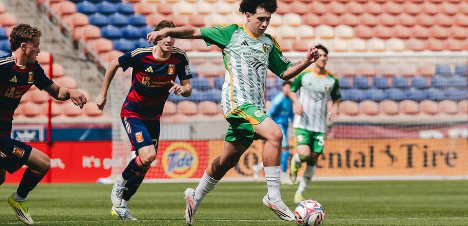 Player from Portland Timbers II dribbling the ball