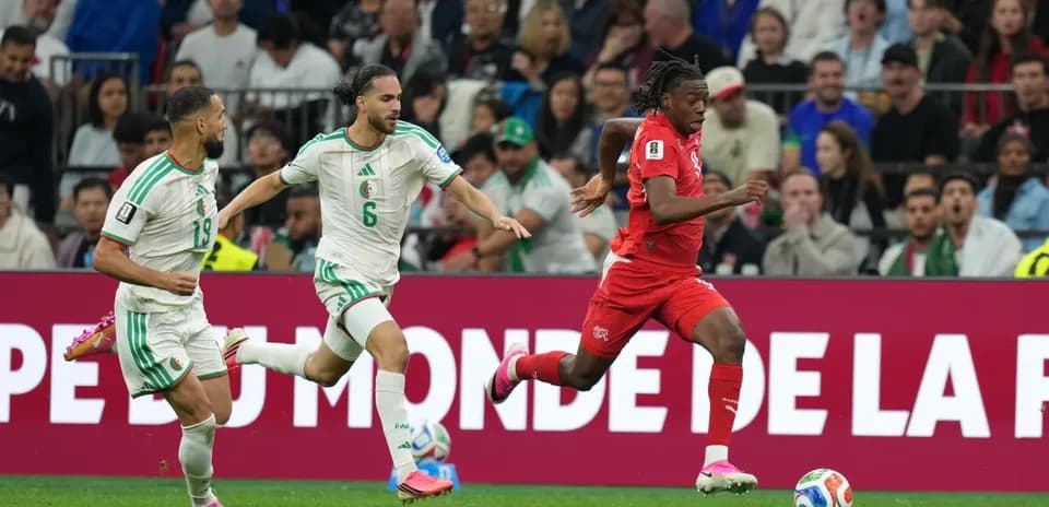 Player running with ball during Switzerland vs Algeria