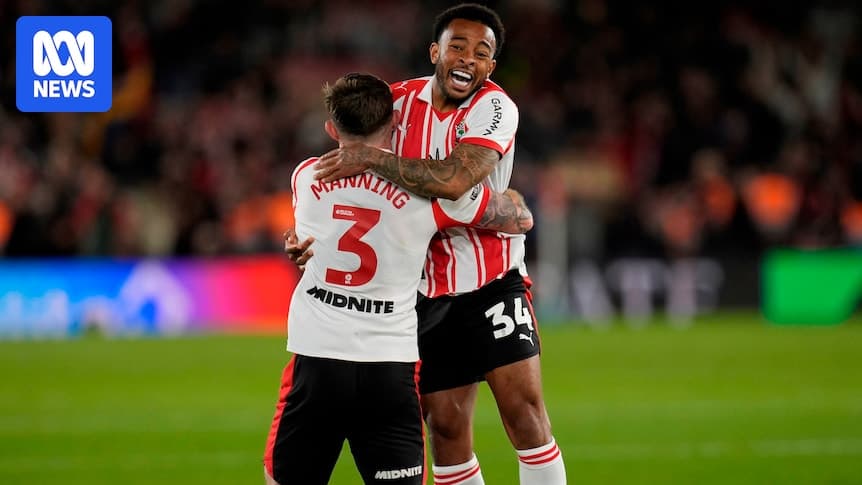 Two players celebrating together after a match