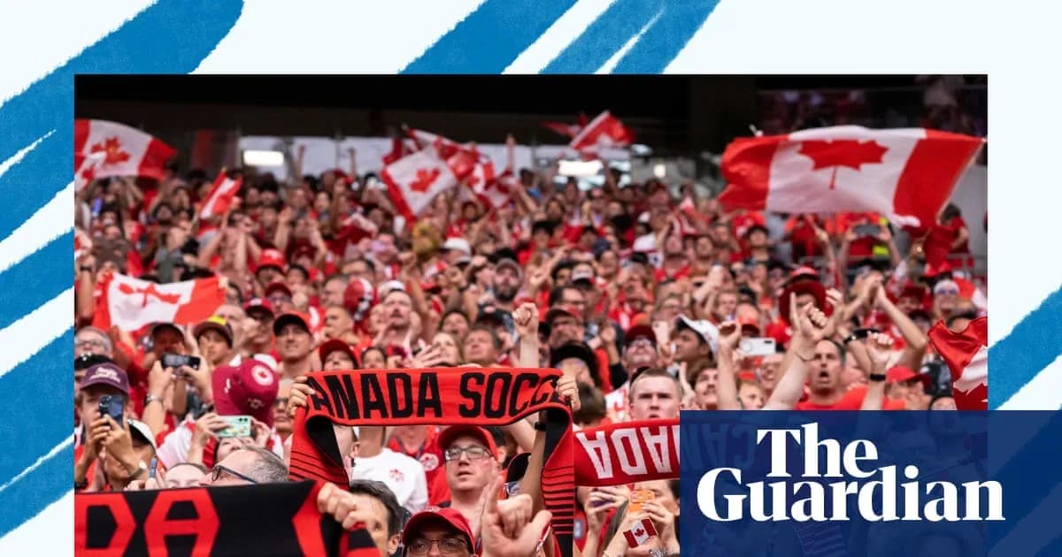 Crowd of fans waving Canadian flags at match