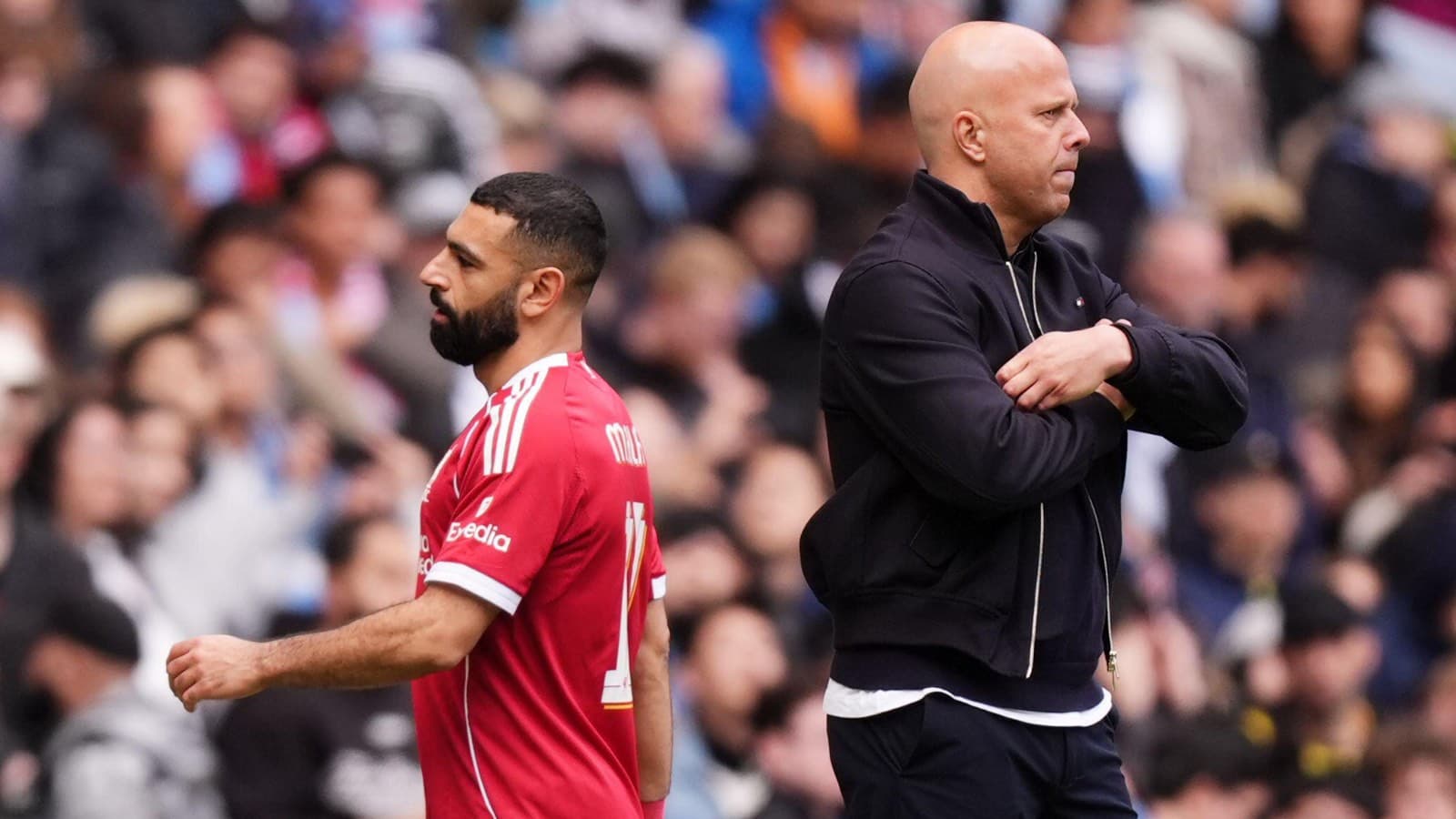 Player walking past coach during a match
