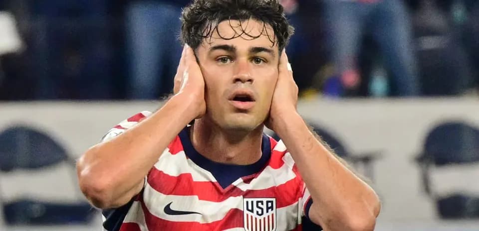 Player in USA jersey reacting during a match
