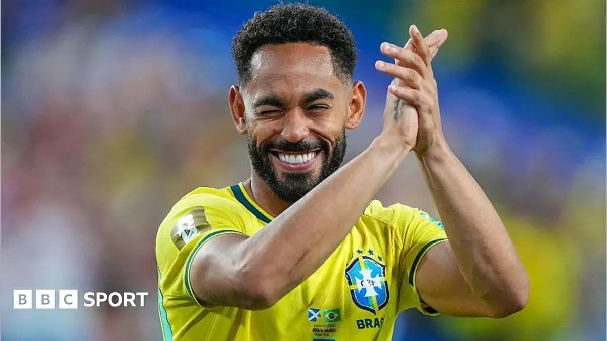 Player in Brazil jersey clapping during match