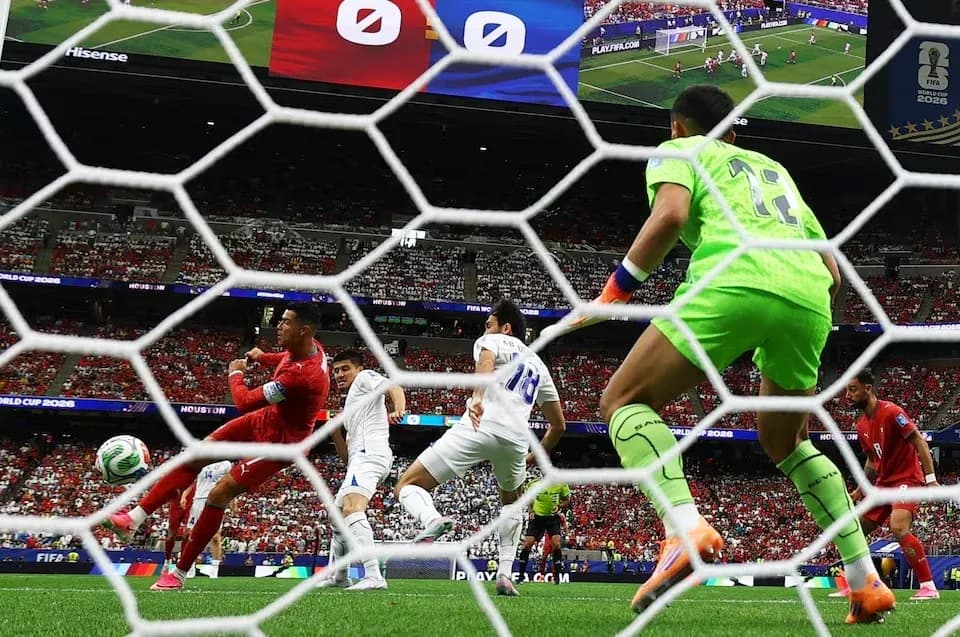 Goalkeeper preparing to save a shot during match