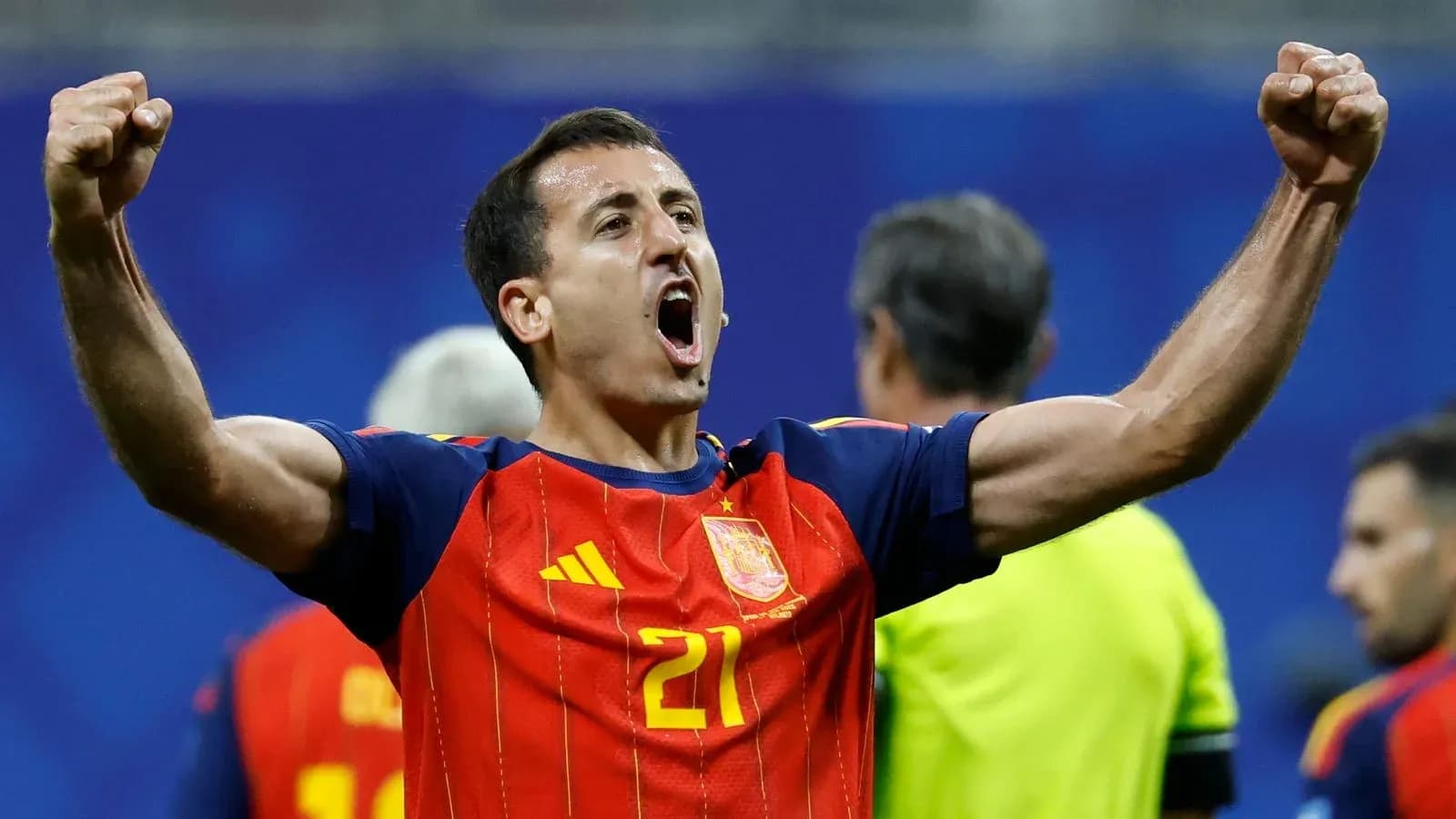 Player celebrating victory wearing Spain jersey