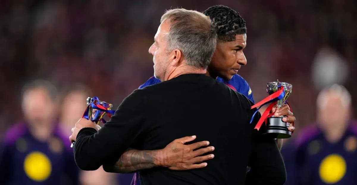 Coach embracing player with trophies after match