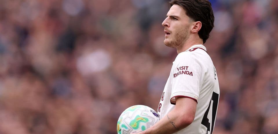 Player holding ball during match action