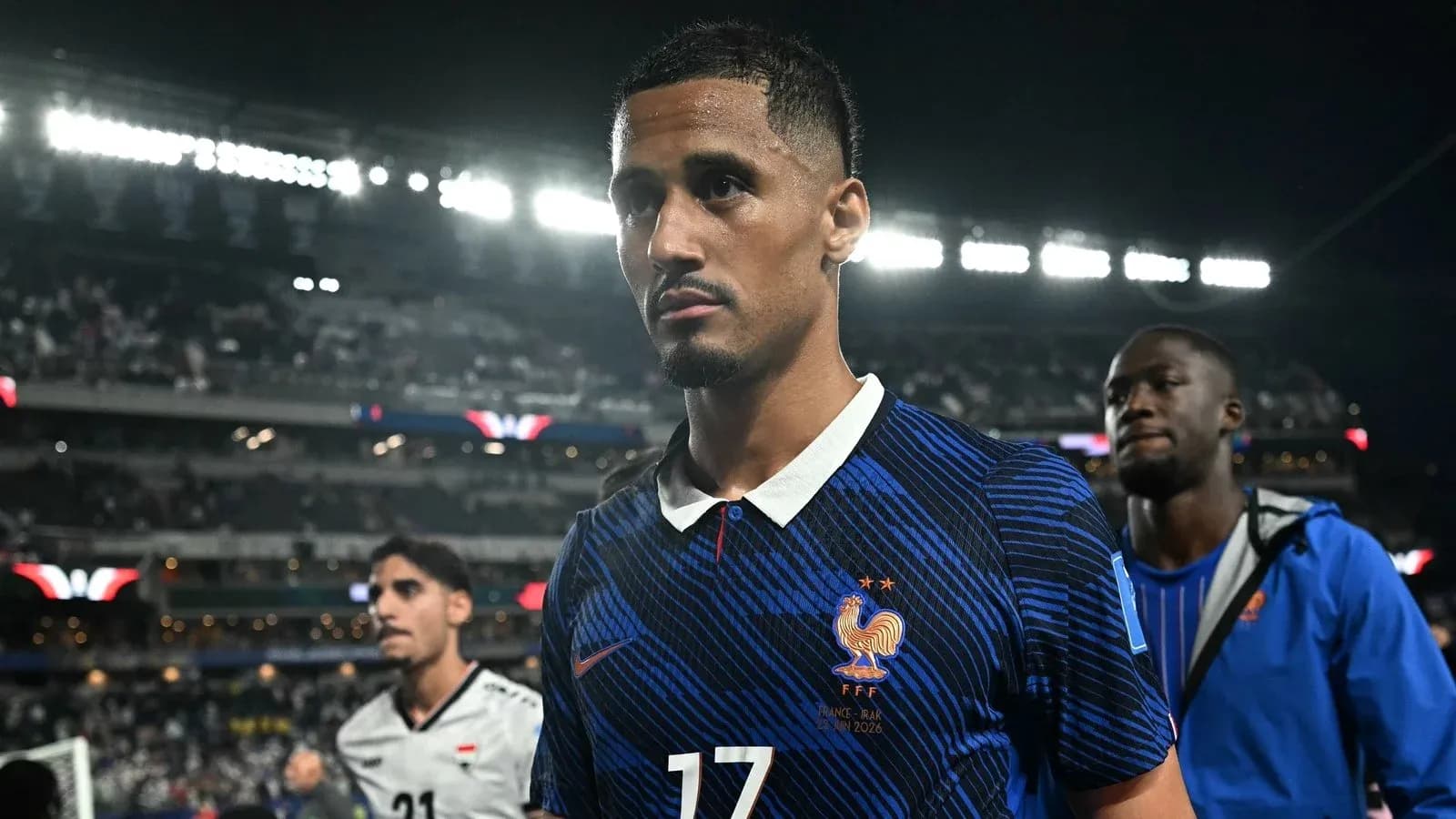 Player walking off field after match in stadium