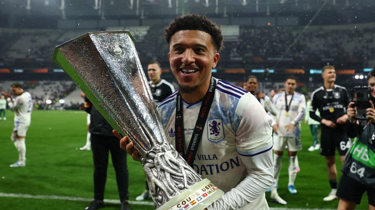 Player celebrating with UEFA Europa League trophy