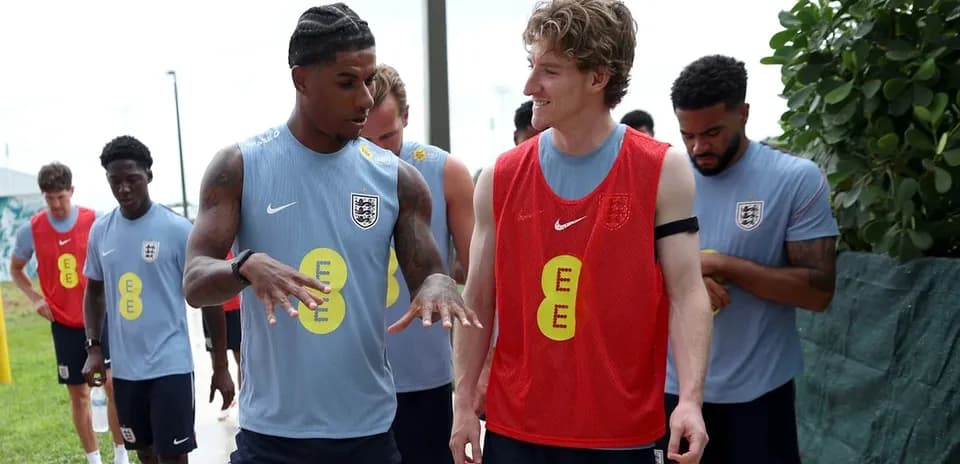 Players engaging in conversation during training session