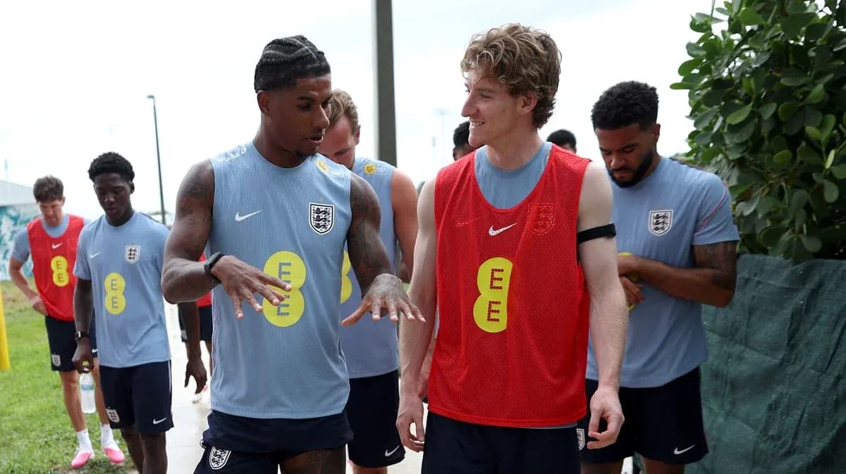 Players engaging in conversation during training session