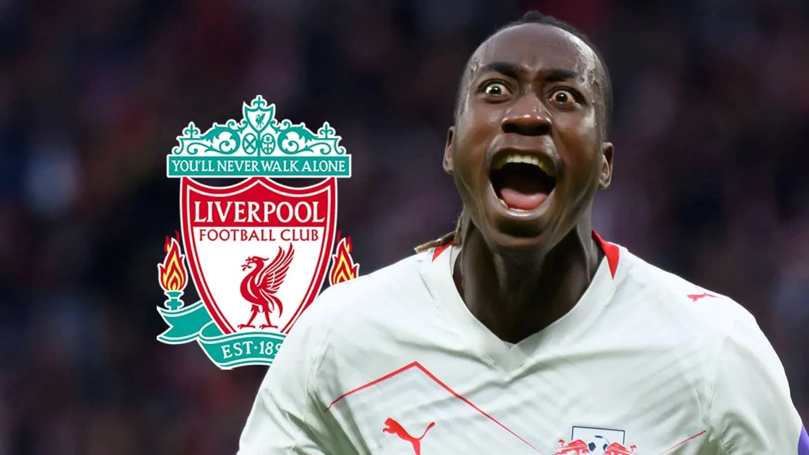 Player celebrating with Liverpool logo in background
