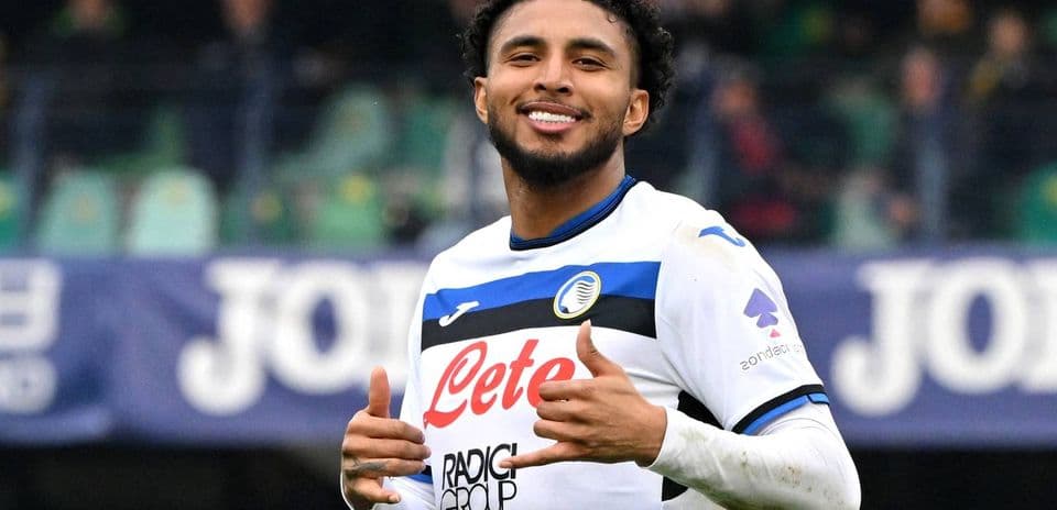 Player celebrating with thumbs up after scoring