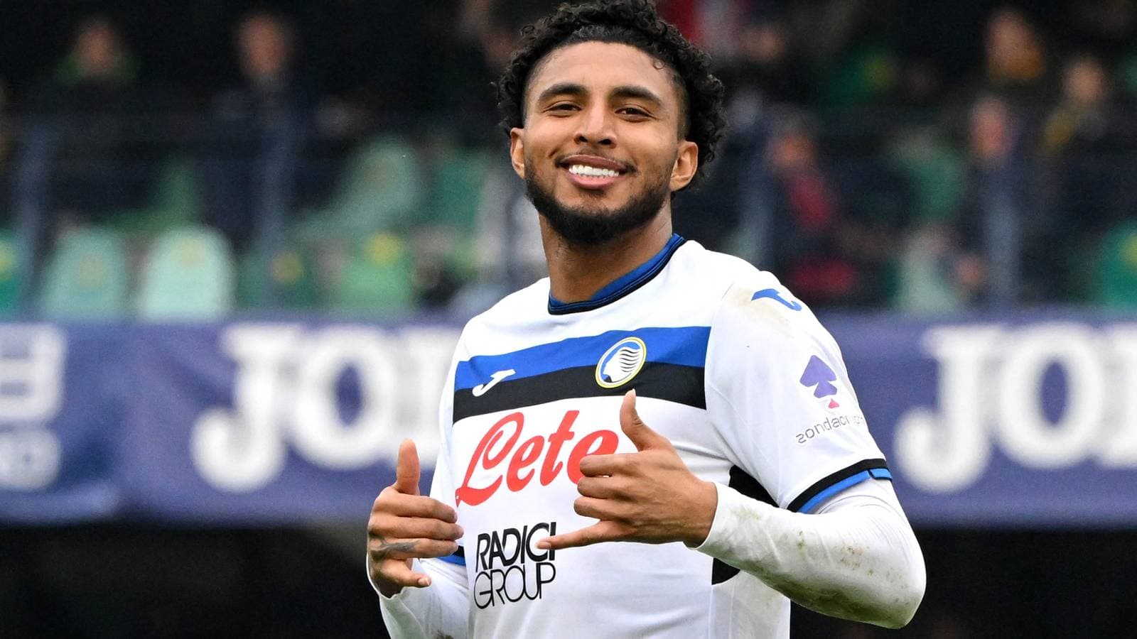 Player celebrating with thumbs up after scoring