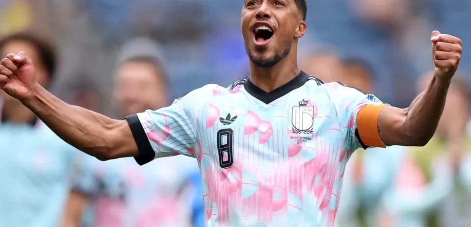Player celebrating in Belgium football jersey