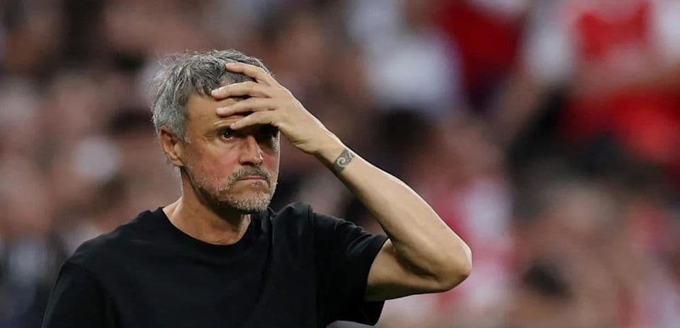 Manager expressing concern during a match