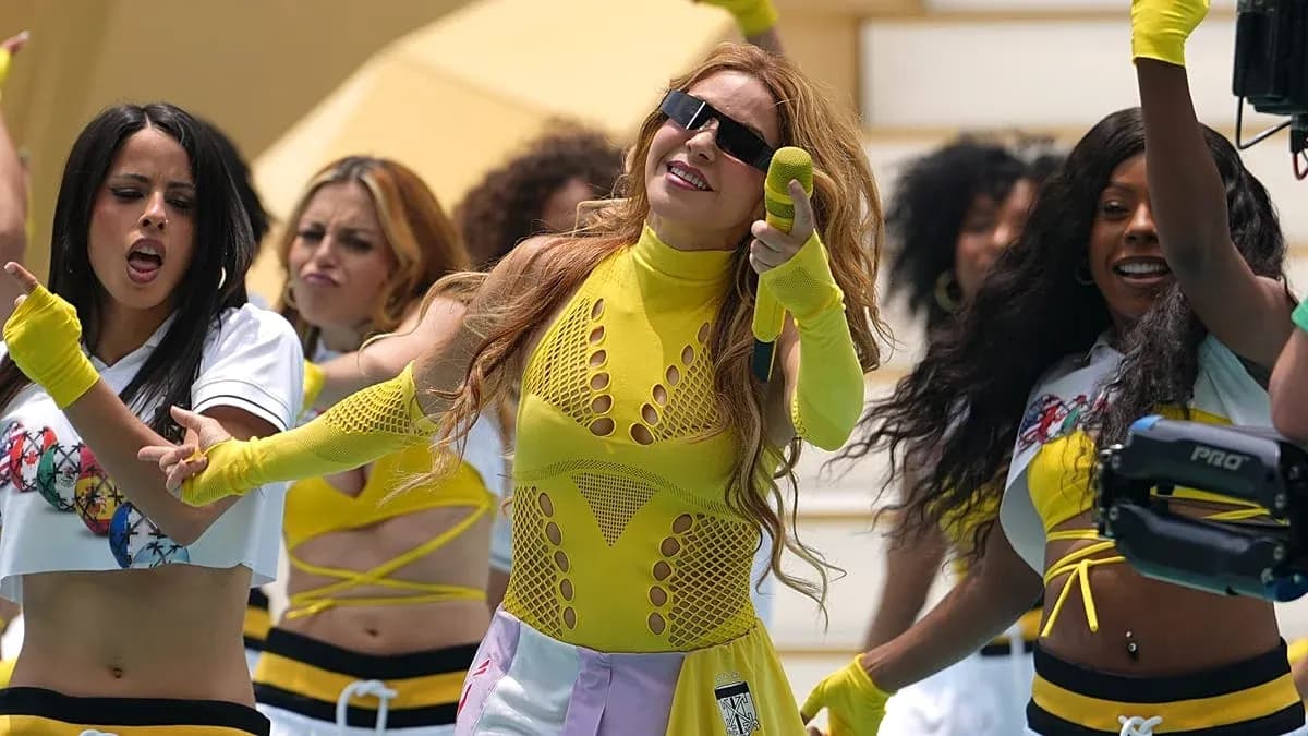 Performers dancing in colorful outfits during a show