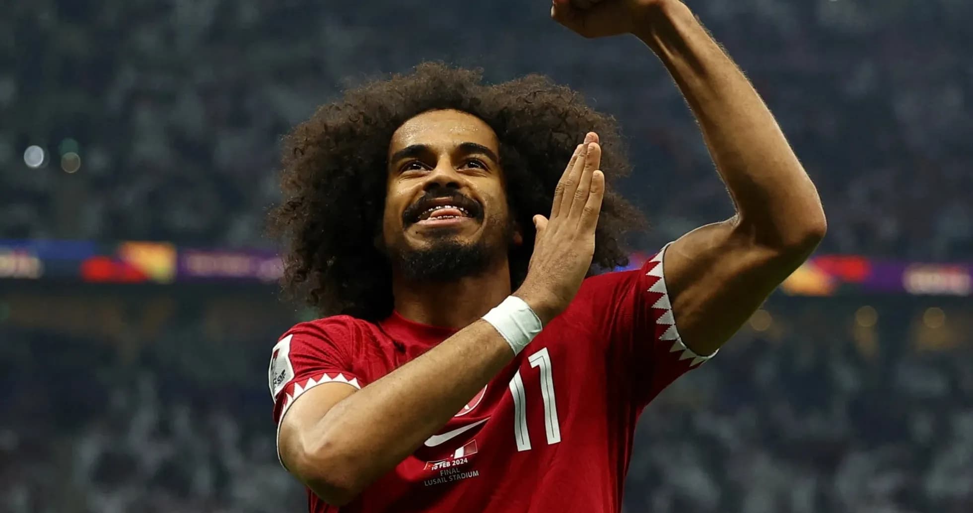 Qatari player celebrating during match